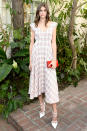 <p><strong>25 October</strong> Kaia Gerber looked elegant in a mid-length checked dress which she teamed with white shoes and a red clutch bag for a CFDA event in Los Angeles.</p>