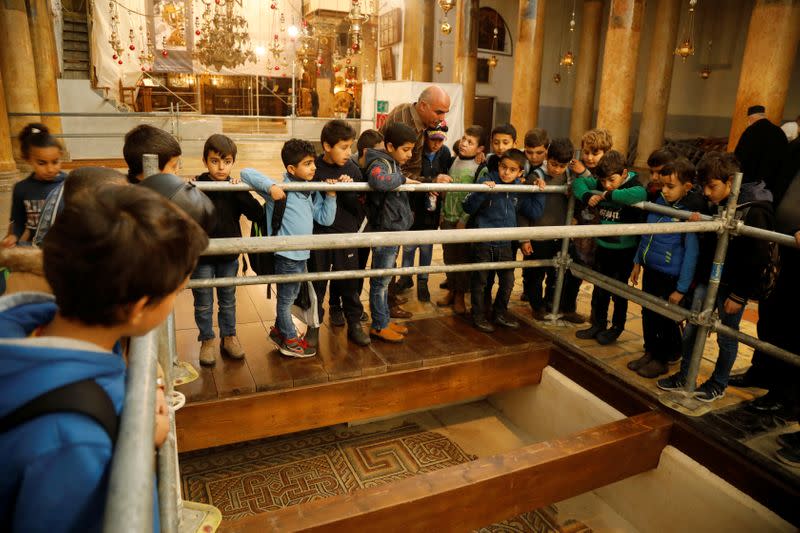 Palestinian schoolchildren visit the Church of the Nativity in Bethlehem in the Israeli-occupied West Bank