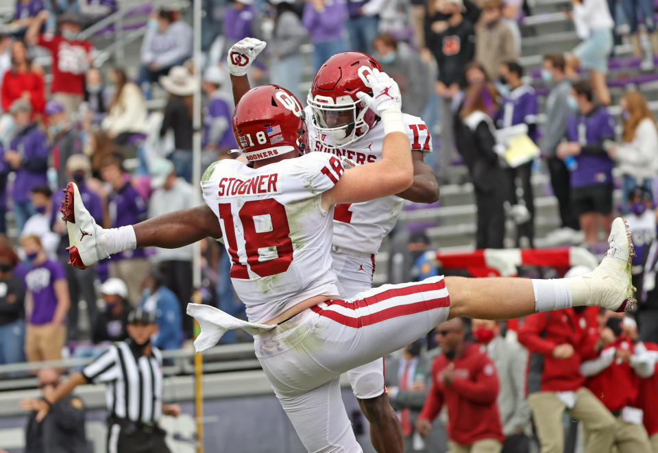 Oct. 24, 2020; Fort Worth, Texas; Oklahoma Sooners wide receiver Marvin Mims (17) celebrates with tight end Austin Stogner after scoring a touchdown during the second half against the TCU Horned Frogs at Amon G. Carter Stadium. Kevin Jairaj-USA TODAY Sports