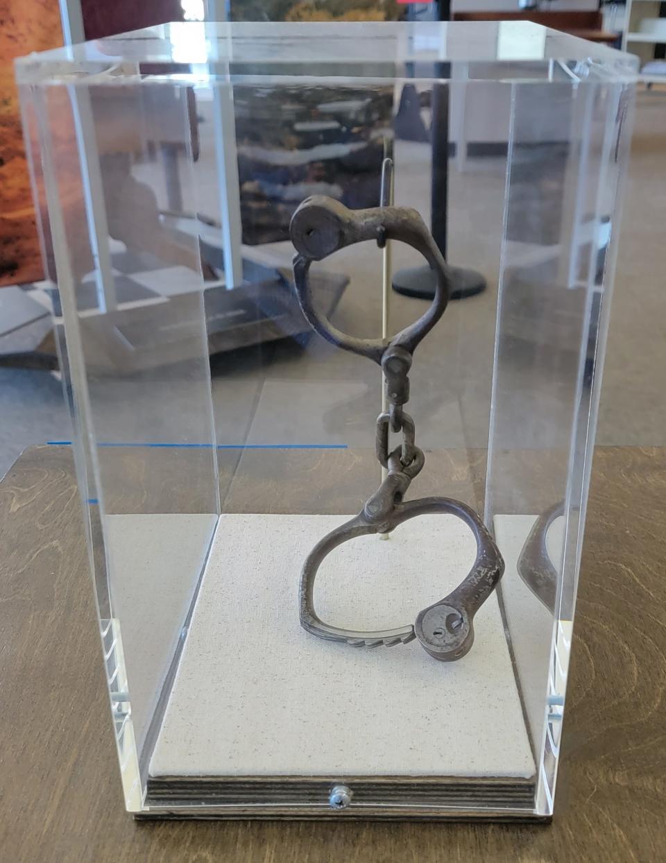 Children's manacles on display at Manitowoc Public Library as part of the National Endowment for the Humanities On the Road Exhibition on American Indian boarding schools. The exhibit runs through Aug. 11.