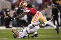 San Francisco 49ers wide receiver Brandon Aiyuk, top, catches a pass against Detroit Lions cornerback Kindle Vildor (29) during the second half of the NFC Championship NFL football game in Santa Clara, Calif., Sunday, Jan. 28, 2024. (AP Photo/Godofredo A. Vasquez)