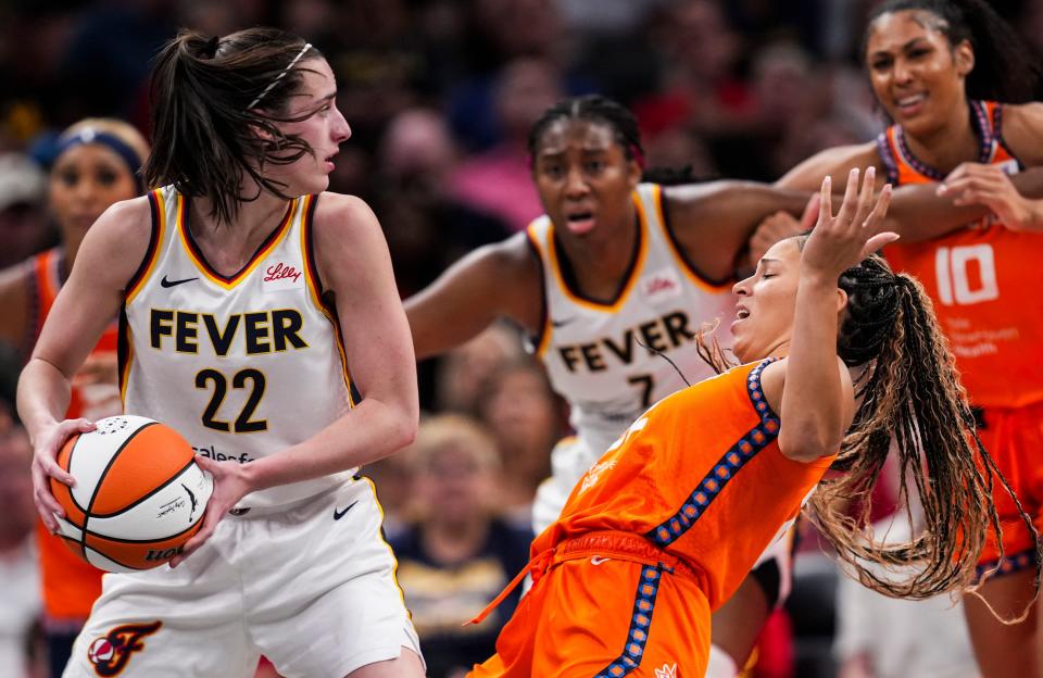 Indiana Fever guard Caitlin Clark (22) runs a play on Wednesday, Aug. 28, 2024, during a game between the Indiana Fever and Connecticut Sun at Gainbridge Fieldhouse in Indianapolis. The Fever defeated the Sun 84-80.