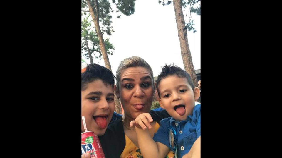 Noora Al Mafraji takes a selfie with her two sons, Yazin and Nezar. Noora was known for her devotion to family, work and selfless acts for others. Provided by Saif Mhadi