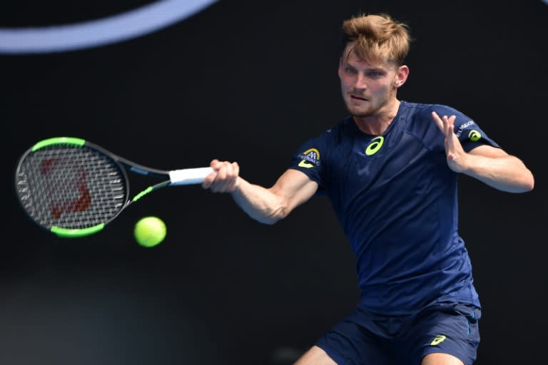 Belgium's David Goffin hits a return against Austria's Dominic Thiem during their Australian Open fourth round match, in Melbourne, on January 23, 2017