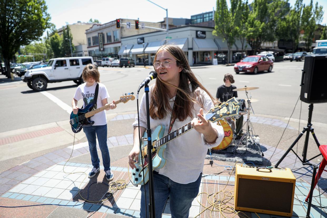 Sunset Bends performs in front of Bentley’s during Make Music Day on Wednesday, June 21, 2023 in Salem, Ore.