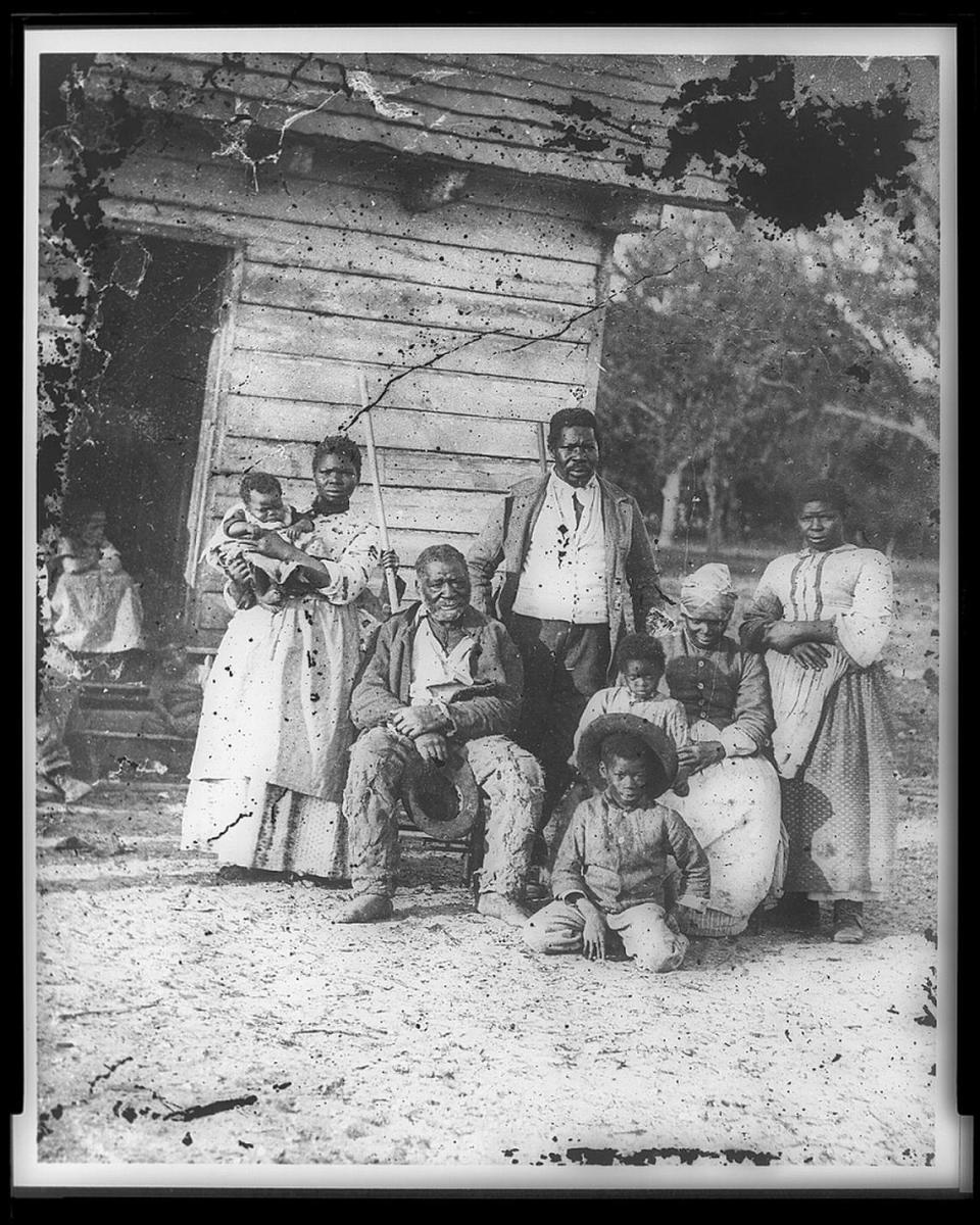 Five generations of slaves are pictured here in front of Smith’s Plantation in Beaufort. The plantation was later turned into a U.S. Army camp and is in the present day Town of Port Royal.