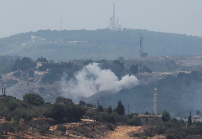 Smoke rises from Dhayra village after Israeli shelling as pictured from the Lebanese town of Marwahin