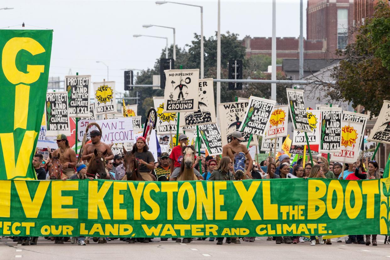 In this Aug. 6, 2017, file photo, demonstrators against the Keystone XL pipeline march in Lincoln, Neb.  (Photo: AP Photo/Nati Harnik, file)