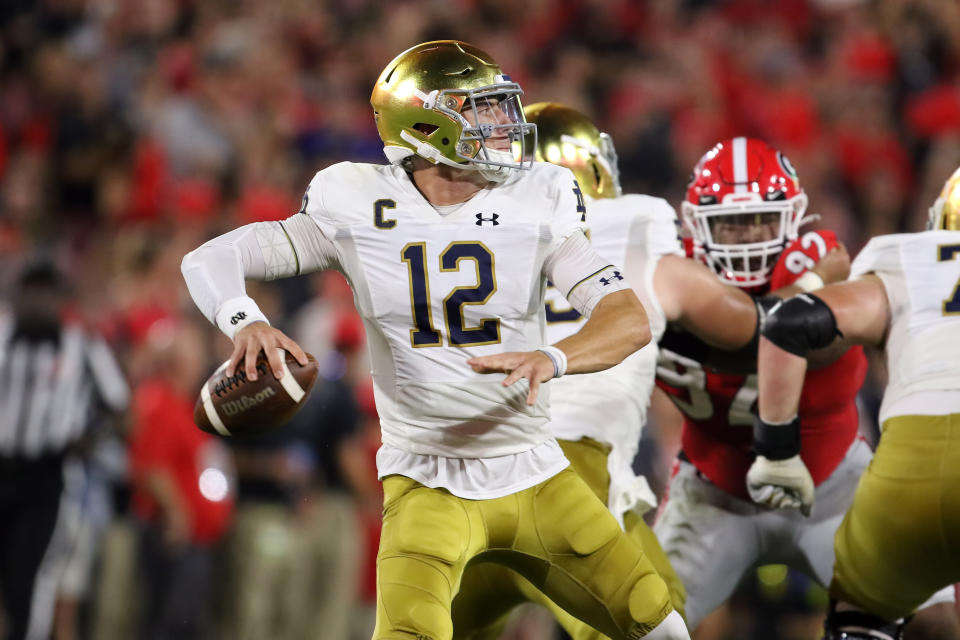 ATHENS, GA - SEPTEMBER 21: Notre Dame Fighting Irish quarterback Ian Book (12) throws downfield in the game between the Georgia Bulldogs and the Notre Dame Fighting Irish on September 21, 2019 at Sanford Stadium in Athens, Georgia. (Photo by Michael Wade/Icon Sportswire via Getty Images)