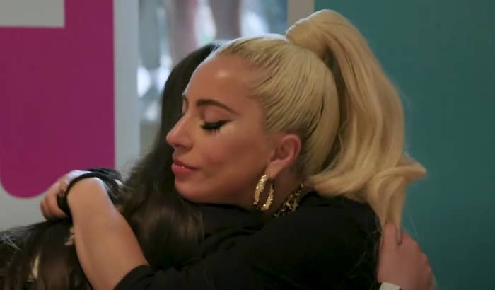 Lady Gaga hugging a young girl