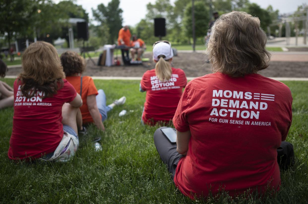 In response to the death of Olivia Kurtz at Bicentennial Park over the weekend, members of Moms Demand Action attend a community rally held by Mothers of Murdered Columbus Children at the site of the shooting on Monday, May 24, 2021. 