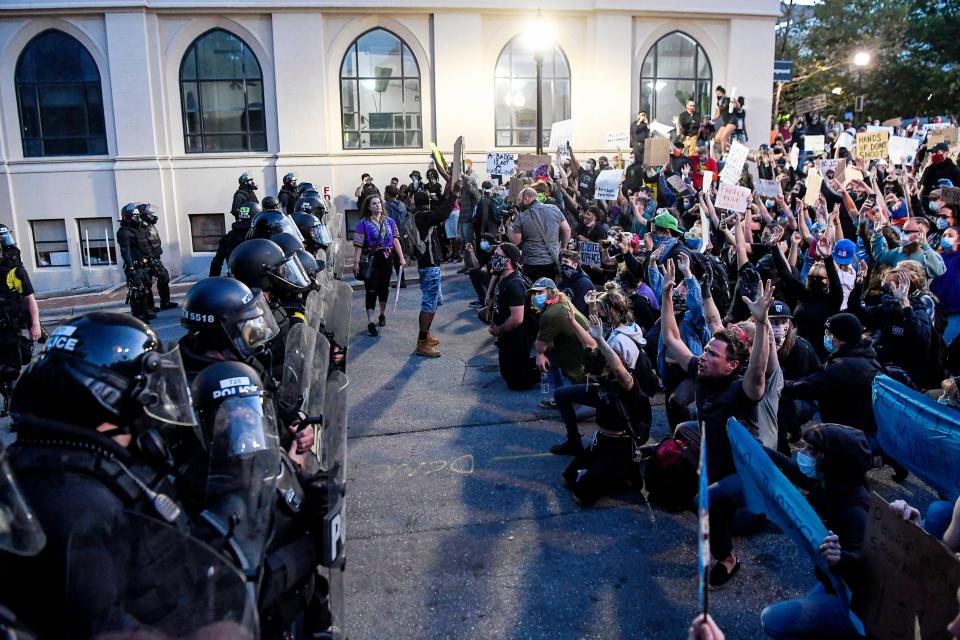 Hundreds gathered at Vance Monument in downtown Asheville June 1, 2020 to protest police brutality before continuing on to Asheville Police Department.