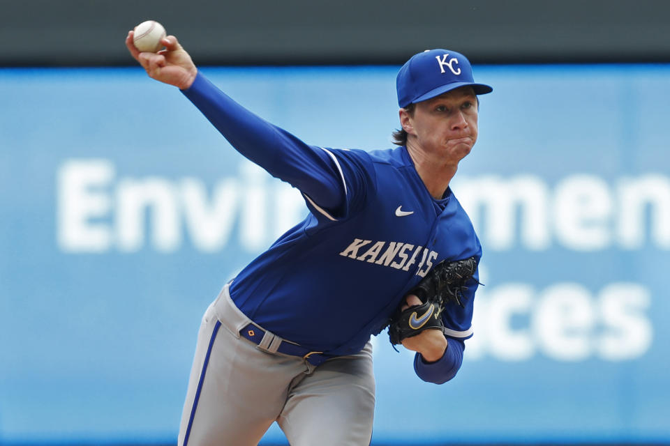 Kansas City Royals starting pitcher Brady Singer throws to the Minnesota Twins in the first inning of a baseball game, Sunday, April 30, 2023, in Minneapolis. (AP Photo/Bruce Kluckhohn)