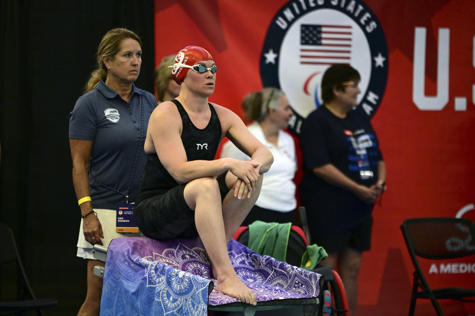 Christie Raleigh Crossley waits on the block before swimming the Women's 100 freestyle at the 2024 U.S. Paralympic Swim Team Trials in Minneapolis, Friday, June 28, 2024. (AP Photo/Leighton Smithwick)
