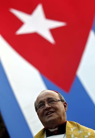 Cuba's Cardinal Jaime Ortega, leader of Cuba's Catholic Church, attends a procession to honour the statue of Our Lady of Charity, the patroness of Cuba, in Havana in this November 12, 2011 file picture. REUTERS/Enrique de la Osa/Files