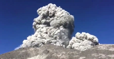 A volcano is seen erupting in Central Java, Indonesia, in this May 11, 2018 still image taken from a video obtained from social media. Courtesy of Shopan Pangestu/via REUTERS