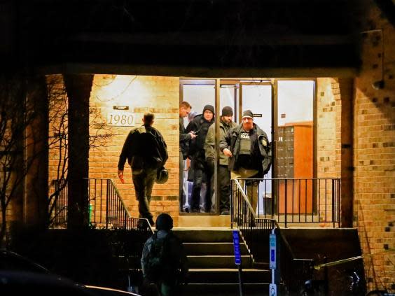 Police search the flat of Gary Martin, who is believed to be responsible for a mass shooting at the Henry Pratt Company, in Aurora, Illinois, USA, which killed five people and left five police officers injured on 15 February, 2019. (EPA/TANNEN MAURY)