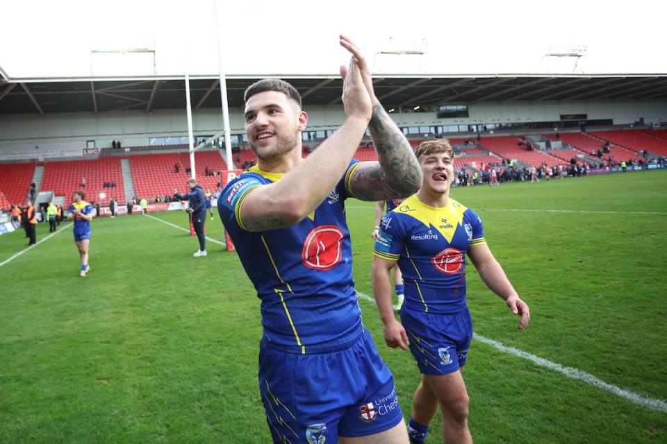 Connor Wrench applauds the Wire fans following the victory at St Helens <i>(Image: SWPix.com)</i>