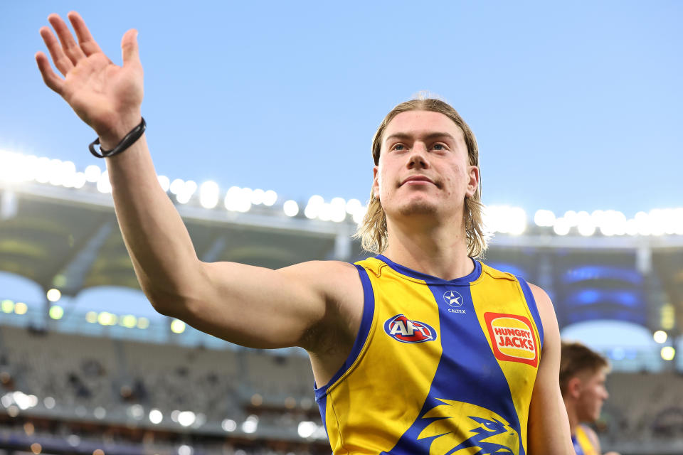 PERTH, AUSTRALIA - JUNE 01: Harley Reid of the Eagles waves to supporters while walking from the grou after being defeated during the round 12 AFL match between West Coast Eagles and St Kilda Saints at Optus Stadium, on June 01, 2024, in Perth, Australia. (Photo by Paul Kane/Getty Images)