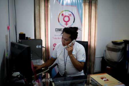 Karla Avelar, executive director of the Association for Communicating and Training Trans Women (COMCAVIS TRANS), works at her office in San Salvador, El Salvador, May 12, 2017. REUTERS/Jose Cabezas