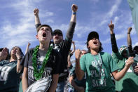 Philadelphia Eagles fans cheer as the the team arrives for the NFL Super Bowl 57 football game between the Kansas City Chiefs and the Philadelphia Eagles, Sunday, Feb. 12, 2023, in Glendale, Ariz. (AP Photo/Ross D. Franklin)