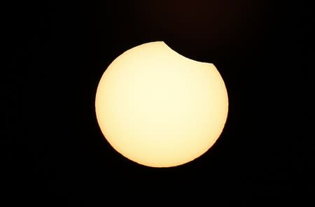 A partial solar eclipse is observed at Coquimbo