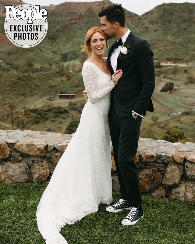 <p>Pitch Perfect star Brittany Snow revealed her classic, but low-key, wedding dress with People Magazine.</p><p>The 33 year-old wore a stunning lace Jonathan Simkhai gown which featured a scoop neck, sheer arms and a train to marry Tyler Stanaland in Malibu.</p><p><a href="https://www.instagram.com/p/B9wtU_nJKgP/" rel="nofollow noopener" target="_blank" data-ylk="slk:See the original post on Instagram;elm:context_link;itc:0;sec:content-canvas" class="link ">See the original post on Instagram</a></p>