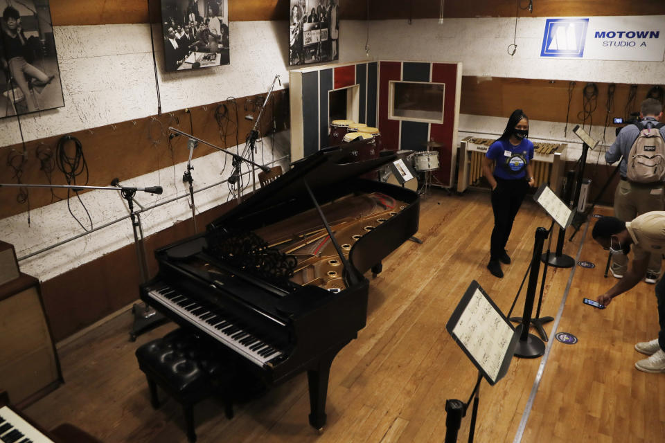 Motown Museum tour guide Jamia Henry talks about Studio A in the museum, Wednesday, July 15, 2020, in Detroit. The Detroit building where Berry Gordy Jr. built his music empire reopened its doors to the public on Wednesday. It had been closed since March due to the coronavirus pandemic. (AP Photo/Carlos Osorio)