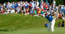 PONTE VEDRA BEACH, FL - MAY 10: Phil Mickelson of the United States hits an approach shot on the fifth hole during the first round of THE PLAYERS Championship held at THE PLAYERS Stadium course at TPC Sawgrass on May 10, 2012 in Ponte Vedra Beach, Florida. (Photo by Mike Ehrmann/Getty Images)