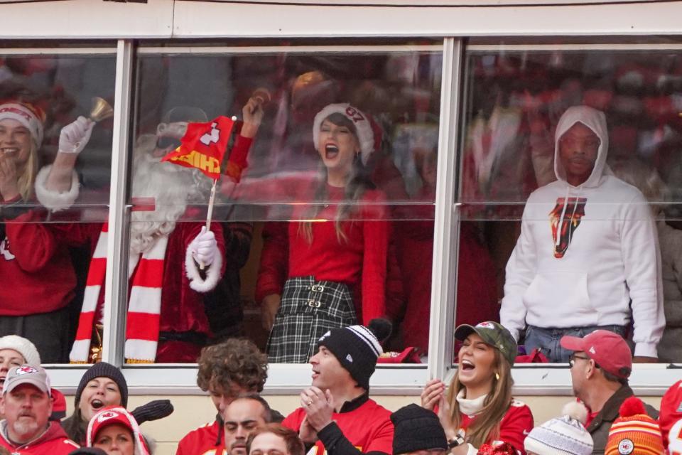 Singer-songwriter Taylor Swift cheers for the Chiefs during the first half of their game against the Las Vegas Raiders at Arrowhead Stadium in Kansas City.