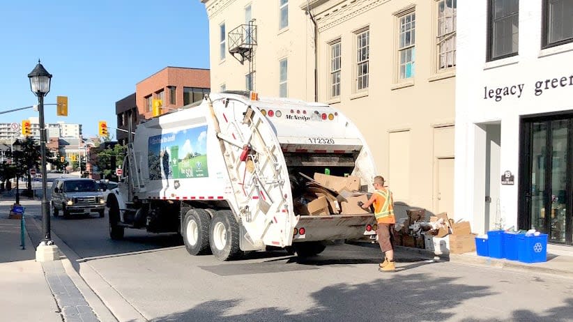 Changes in the new contract include a switch to carts from bins, greener trucks and a four-day collection week. (Kate Bueckert/CBC - image credit)