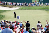 FARMINGDALE, NY - AUGUST 23: Tiger Woods putts on the 17th green during the First Round of The Barclays on the Black Course at Bethpage State Park August 23, 2012 in Farmingdale, New York. (Photo by Kevin C. Cox/Getty Images)