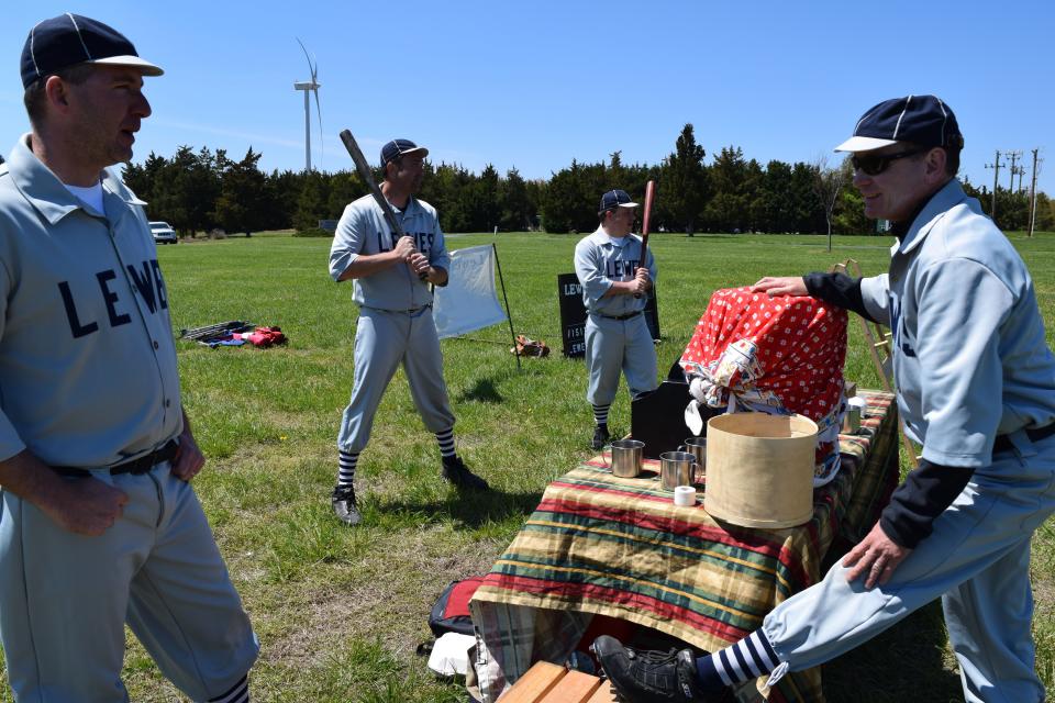 Players stretch and warm up between innings during a vintage baseball match between the Lewes Base Ball Club and the Elkton Eclipse last April.