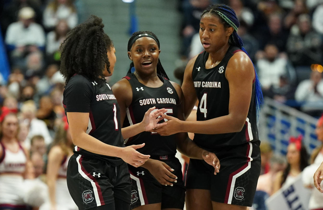 South Carolina guard Zia Cooke, guard Raven Johnson and forward Aliyah Boston talk during a timeout against UConn at XL Center in Hartford, Connecticut, on Feb. 5, 2023. (David Butler II/USA TODAY Sports)