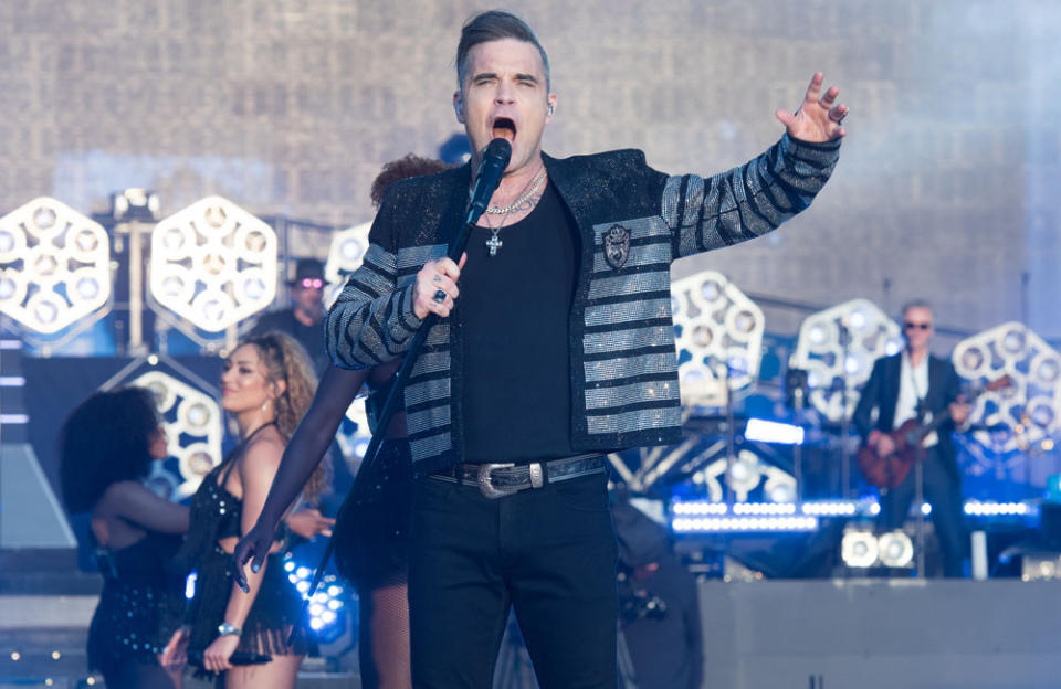 Robbie Williams opens XXV Tour credit:Bang Showbiz