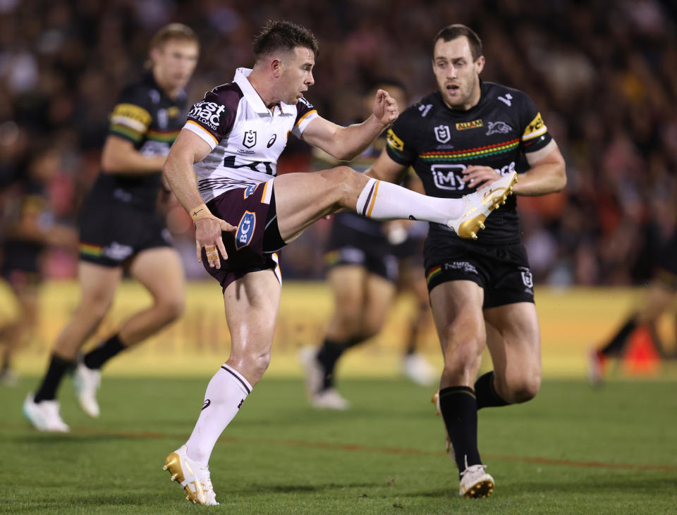 PENRITH, AUSTRALIA – MARCH 21: Jock Madden of the Broncos kicks during the round three NRL match between the Penrith Panthers and the Brisbane Broncos at BlueBet Stadium on March 21, 2024 in Penrith, Australia. (Photo by Jason McCawley/Getty Images)