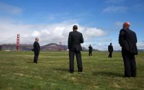 <p>Obama admires a lesser-seen angle of the Golden Gate Bridge from afar. </p>