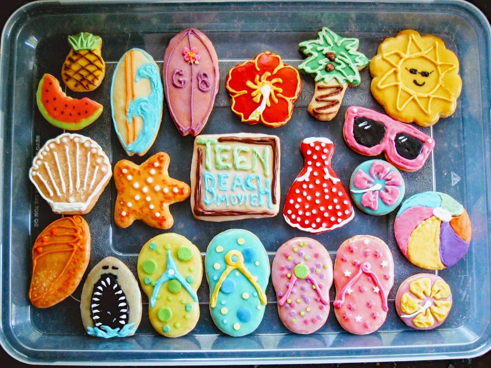 These 2014 lighthearted “Teen Beach Movie” cookies for Mabel’s niece Grace included flip-flops, seashells, hibiscus, a beachball, surfboards and even a shark.