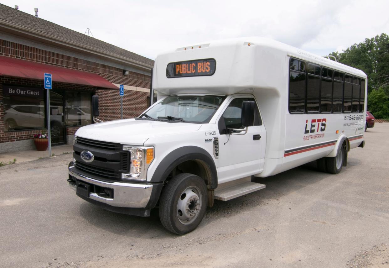 A Livingston Essential Transportation Service bus picks up passengers at Oceola Township's Be Our Guest Adult Day Care Wednesday, June 30, 2021.