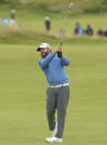 J.B. Holmes of the United States plays his second shot to the 15th green during the second round of the British Open Golf Championships at Royal Portrush in Northern Ireland, Friday, July 19, 2019.(AP Photo/Jon Super)