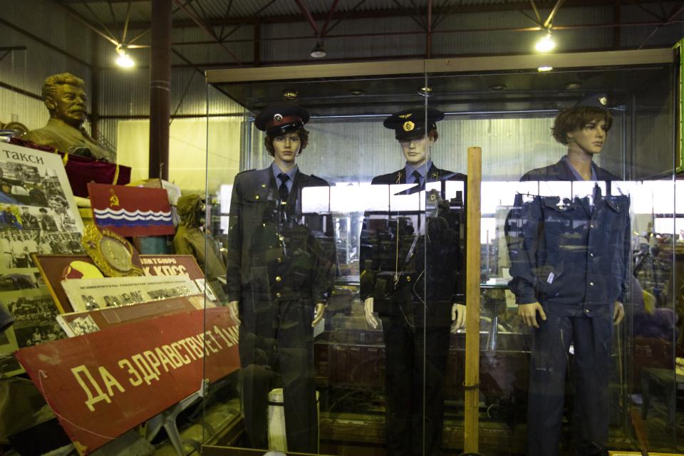 In this photo taken on Sunday, Nov. 3, 2019, mannequins in Soviet style uniforms displayed in the 'Museum of Industrial Culture' in a dilapidated industrial zone of Moscow, Russia. Moscow’s suburbs are the focus of a major international art exhibition that has just opened in the Russian capital. The exhibit uses contemporary art to explore the many hidden facets of life beyond the Russian capital’s nucleus. Austrian cultural attache says the ‘real’ Moscow where most of the city’s 12.6 million people live, is outside the center. (AP Photo/Alexander Zemlianichenko)