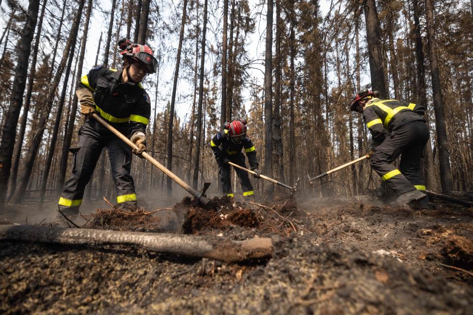 French firefighters battle fires north of the city of Chibugamau, Quebec