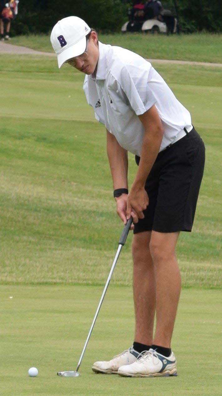 Bloomington South sophomore Landon "Happy" Gilmore lines up a putt during the Panthers' dual match against Bloomington North. The match was later suspended due to inclement weather. (Seth Tow/Herald-Times)