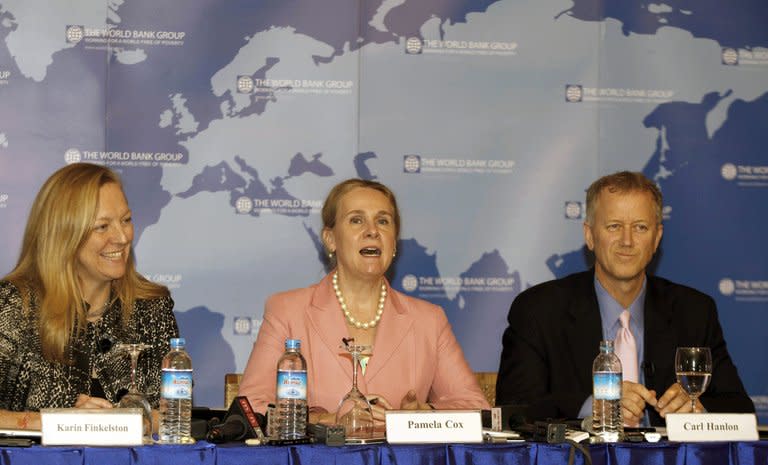 (From L) Karin Finkelston, International Finance Corporation vice president for Asia Pacific, Pamela Cox, World Bank East Asia and Pacific vice president and, Carl Hanlon, World Bank director of communications, talk to the media during a press conference in Yangon, on August 1, 2012. The West has begun rolling back sanctions and foreign firms are lining up to invest in the country