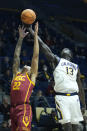 California forward Kuany Kuany (13) and Southern California guard Tre White (22) compete for a rebound during the first half of an NCAA college basketball game in Berkeley, Calif., Wednesday, Nov. 30, 2022. (AP Photo/Godofredo A. Vásquez)