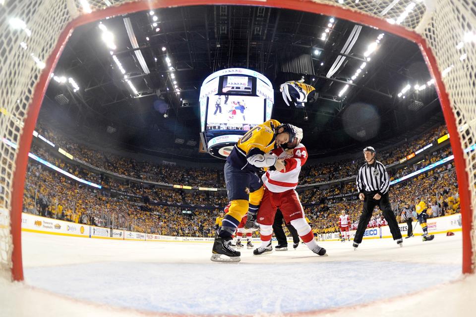 NASHVILLE, TN - APRIL 13: Todd Bertuzzi #44 of the Detroit Red Wings and Shea Weber #6 of the Nashville Predators fight in Game Two of the Western Conference Quarterfinals during the 2012 NHL Stanley Cup Playoffs at the Bridgestone Arena on April 13, 2012 in Nashville, Tennessee. (Photo by Frederick Breedon/Getty Images)