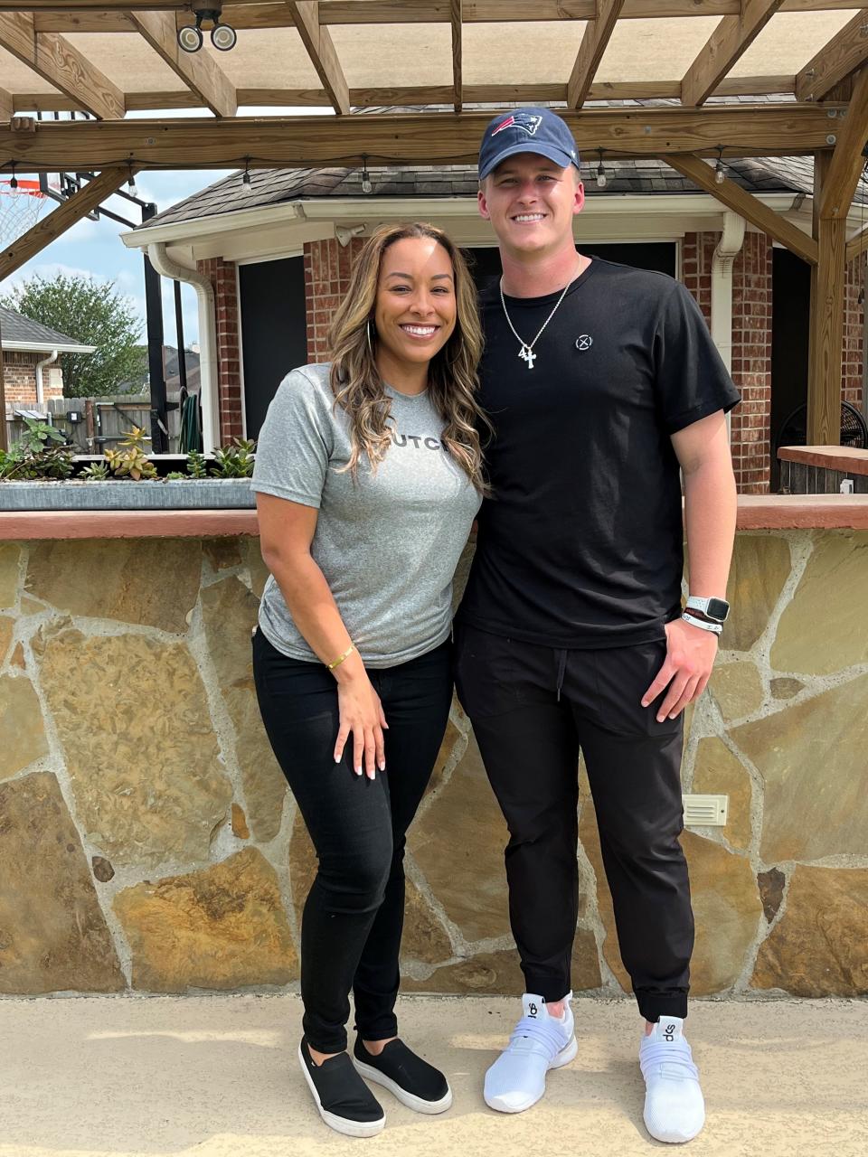 Nicole Lynn (left) and Bailey Zappe celebrate the Western Kentucky quarterback being selected in the fourth round of the 2022 NFL draft by the New England Patriots.