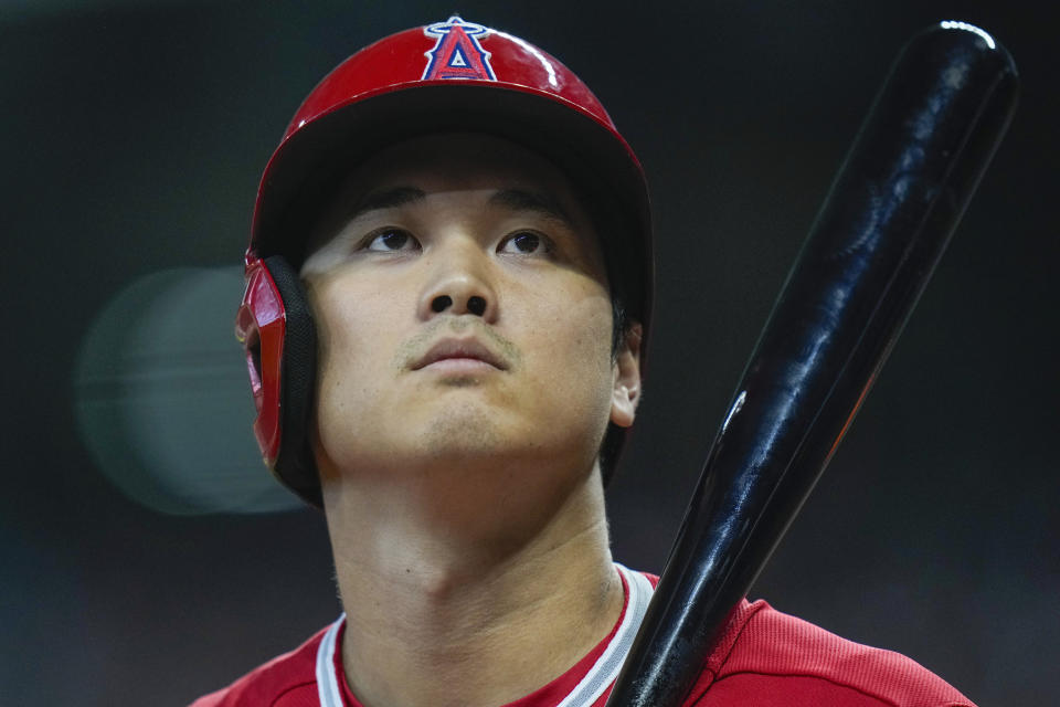 Los Angeles Angels designated hitter Shohei Ohtani stands in the on-deck circle during the first inning of a baseball game against the Houston Astros, Sunday, Aug. 13, 2023, in Houston. (AP Photo/Eric Christian Smith)