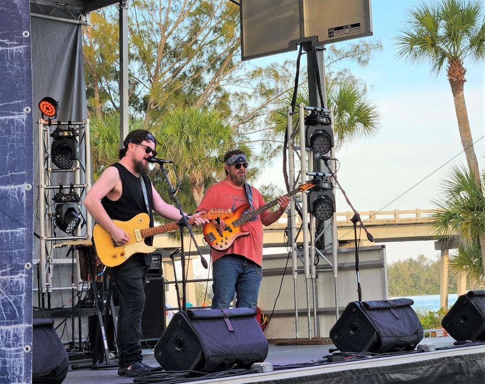 The Damon Fowler Group, with Fowler, left, and Chuck Riley, right, performing March 15, 2024, at Coquina Beach Seafood and Music Festival on Anna Maria Island.