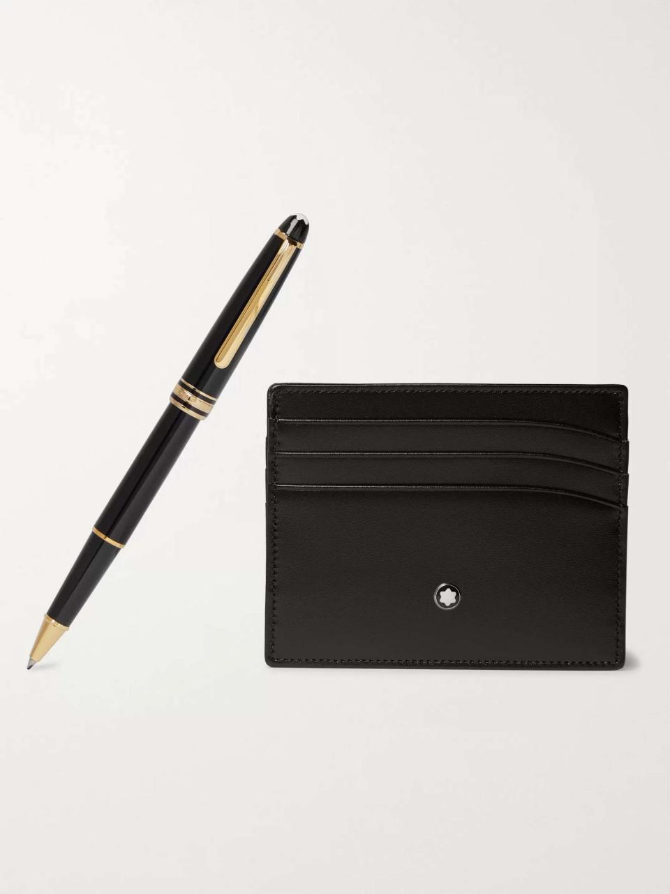 <p><strong>Montblanc</strong></p><p>mrporter.com</p><p><strong>$610.00</strong></p><p><a href="https://go.redirectingat.com?id=74968X1596630&url=https%3A%2F%2Fwww.mrporter.com%2Fen-us%2Fmens%2Fproduct%2Fmontblanc%2Flifestyle%2Fstationery%2Fmeisterstueck-leather-cardholder-and-resin-rollerball-pen-set%2F17957409489389261&sref=https%3A%2F%2Fwww.harpersbazaar.com%2Ffashion%2Ftrends%2Fg4473%2Fmens-holiday-gift-guide%2F" rel="nofollow noopener" target="_blank" data-ylk="slk:Shop Now;elm:context_link;itc:0;sec:content-canvas" class="link ">Shop Now</a></p><p>Update his everyday essentials with Montblanc’s must-have pen set. </p>